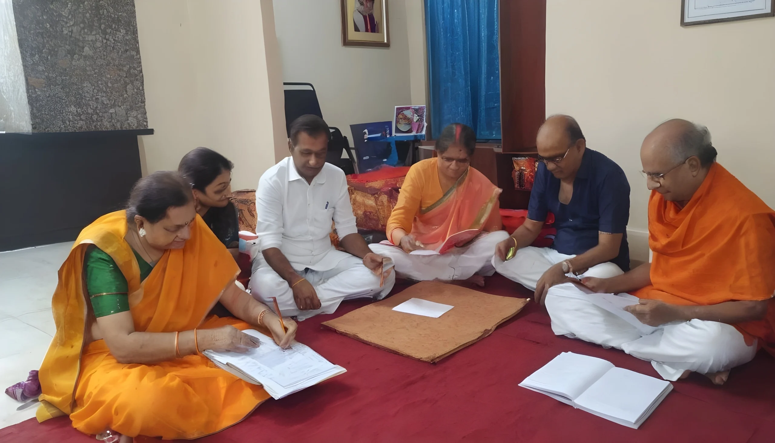 group-of-pandit-working-on-kundli-upscaled